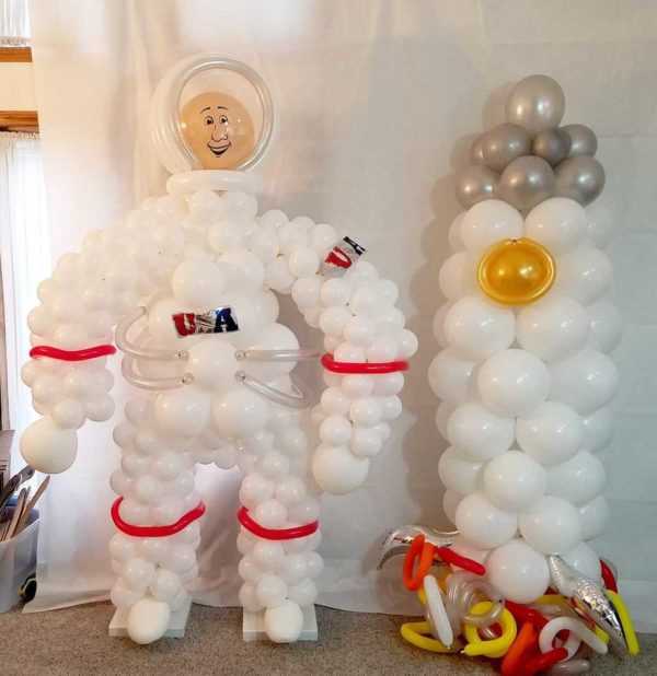 Astronaut Sculpture and Rocket
