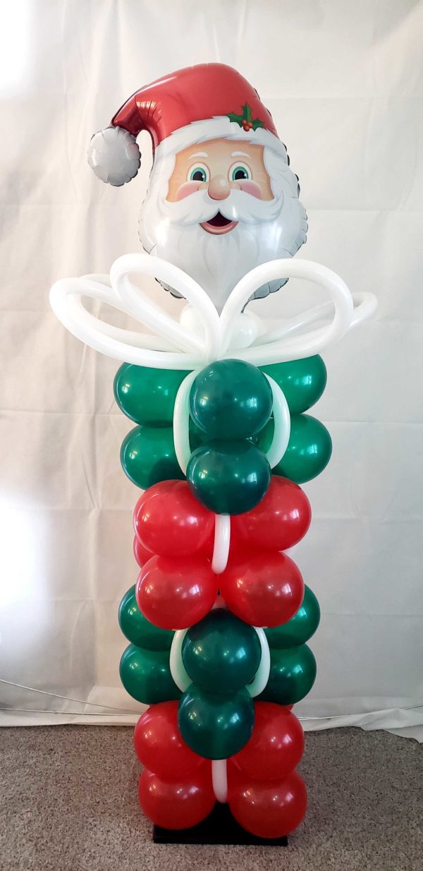 Do you need a special themed balloon columns for your upcoming holiday party? Let us design something special like this Santa present themed column.
