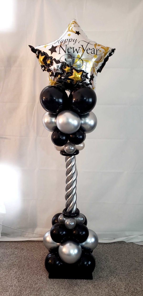 Do you need a specially design or themed column for you your next event? Like this New Year's Eve columns can be built withwhatever theme you have in mind for your event..