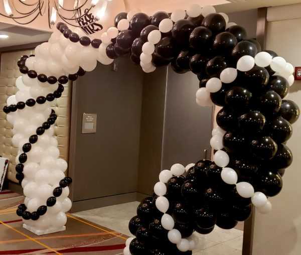 Do you need a special themed or colored arch for an entrance at your next event? Let us design a colored or themed arch that will look Great greeting your guests.