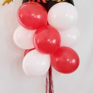 Do you need a special Grad theme balloon yard display? Let us make one of these for that graduate in your life using their school's colors.