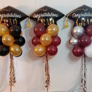 Do you need a school colors Yard Grad pole display? Let us make one of these very popular yard pole displays in the Grads school colors to help celebrate there graduation day event.