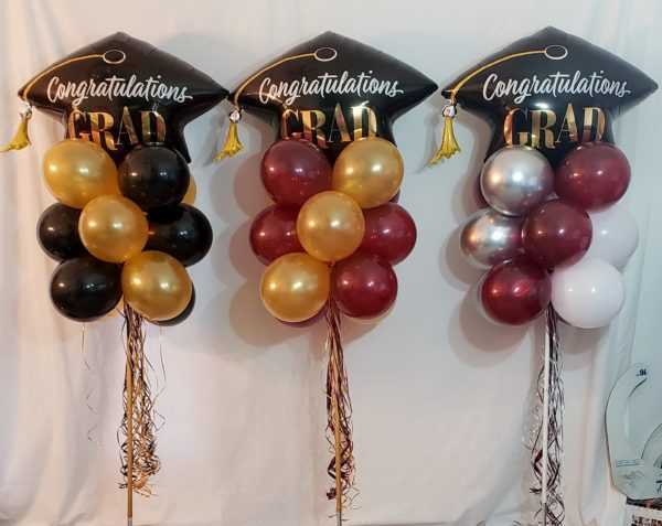 Do you need a school colors Yard Grad pole display? Let us make one of these very popular yard pole displays in the Grads school colors to help celebrate there graduation day event.