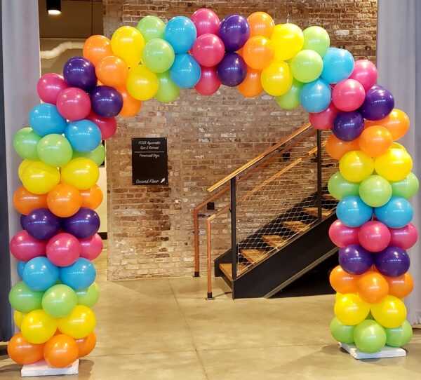 Do you need a balloon arch for your event? Standard balloon arches like this can be done in any color combination so they spiral or done in colored layers like this one.